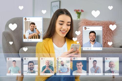 A woman looking at phone surrounded by online dating profiles and hearts